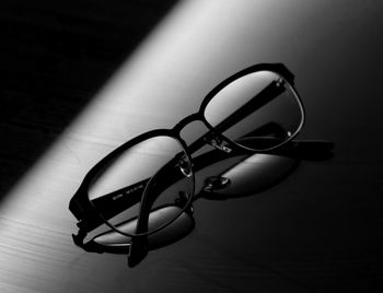 Close-up of sunglasses on table
