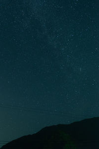 Low angle view of star field against sky at night