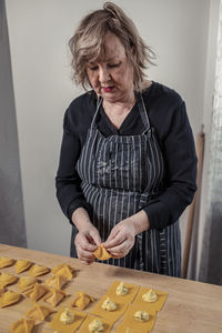 Woman preparing ravioli