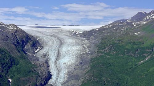 Panoramic view of snowcapped mountains against sky