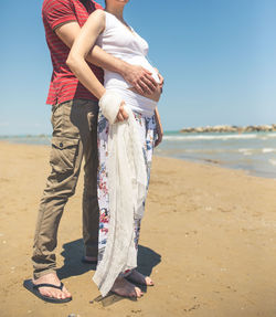 Woman standing on beach