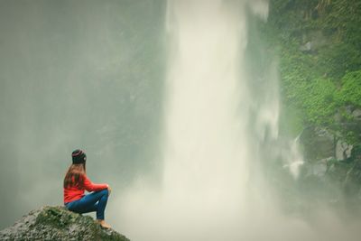 Man sitting in water