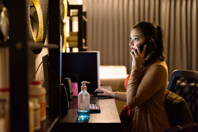 Young woman using mobile phone