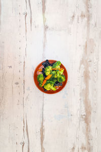 Directly above shot of fruits in bowl on table