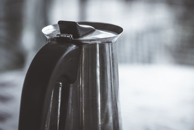 Close-up of bottle against black background