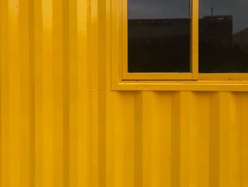 Full frame shot of yellow window on building