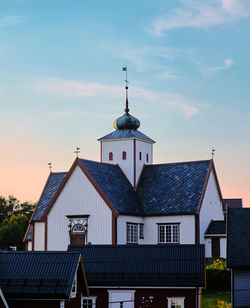 Houses against sky in city