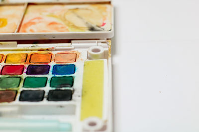 High angle view of paintbrushes on table