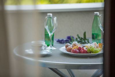 Close-up of fruits in plate on table