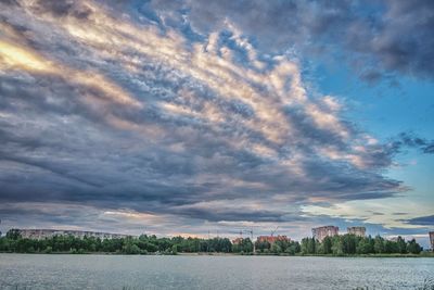 Scenic view of lake against sky during sunset