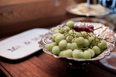 High angle view of fruits in plate on table