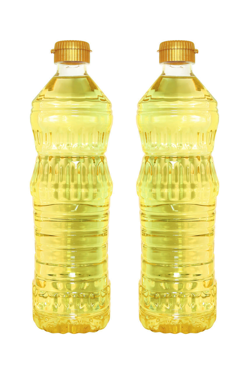 CLOSE-UP OF GLASS BOTTLES