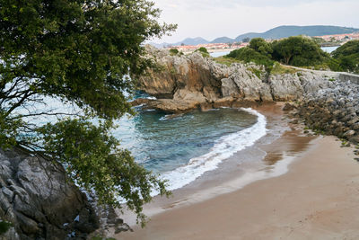 Scenic view of beach against sky