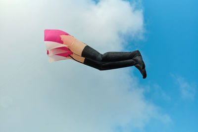 Low angle view of flag against sky