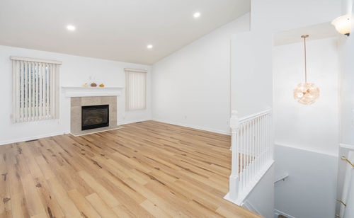 New hard wood flooring has been installed in a renovated home