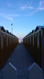 Beach huts against blue sky