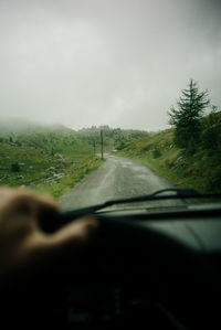 Road seen through car windshield