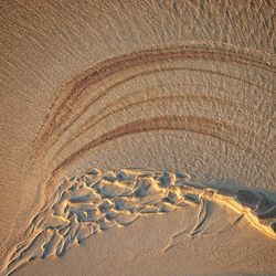 High angle view of sand dune on beach