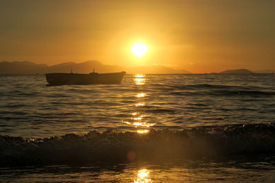 Scenic view of sunset over sea