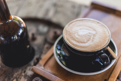 High angle view of coffee cup on table