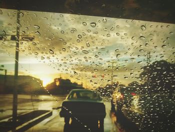 Car on road during sunset