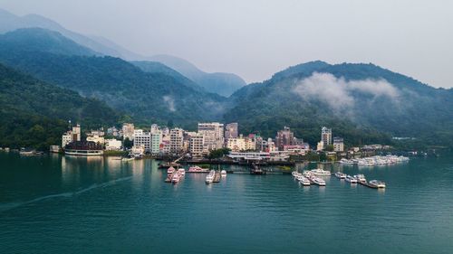 Sailboats in city