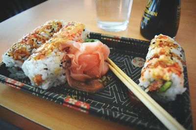 Close-up of sushi served on table