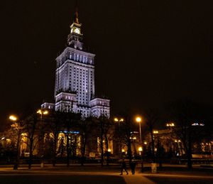 Low angle view of illuminated city at night