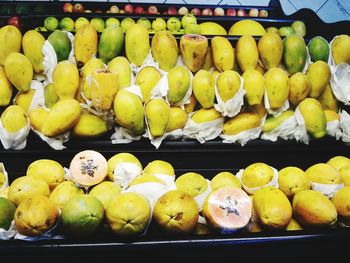 Fruits at market stall for sale