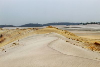 Scenic view of desert against clear sky