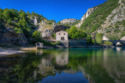 Hermitage and lake of san domenico in abruzzo, italy. small church of medieval origin.