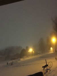 Illuminated street light at night