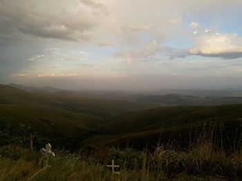 Scenic view of landscape against sky during sunset