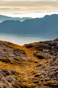 Scenic view of mountains against sky during sunset