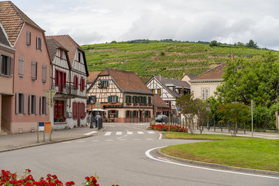 Buildings in city against sky