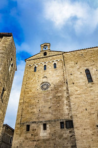 Low angle view of historical building against sky