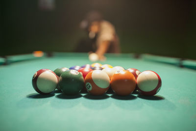 Pool balls on a pool table.