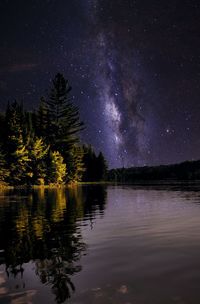 Scenic view of lake against star field