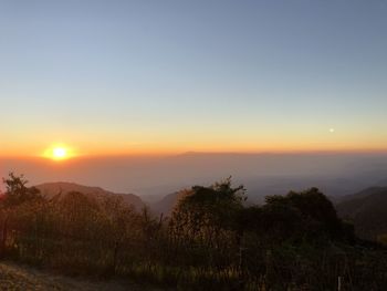 Scenic view of landscape against sky during sunset