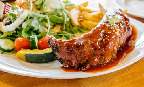 Close-up of food served in plate on table