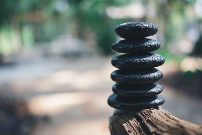 Close-up of stone stack on rock
