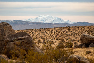 Scenic view of rocky mountains against sky