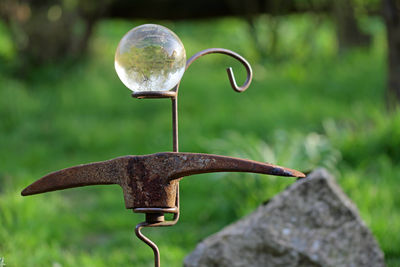 Close-up of water drop on retaining wall