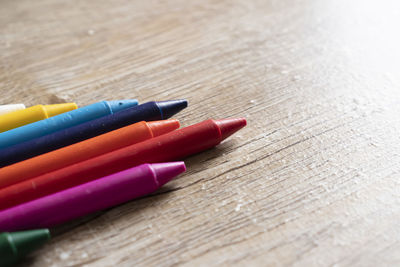 Close-up of crayons on table