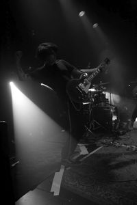 Man playing music in concert