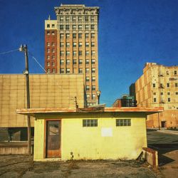 Buildings against blue sky