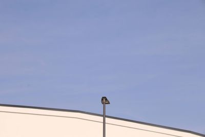 Low angle view of street light against clear sky