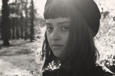 Portrait of young woman outdoors