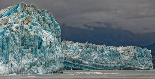 Scenic view of sea against mountain
