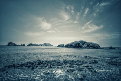 Scenic view of sea against sky during winter